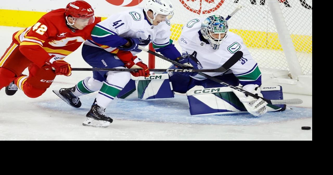 Flames remain hot in pre-season, beat Canucks 4-2