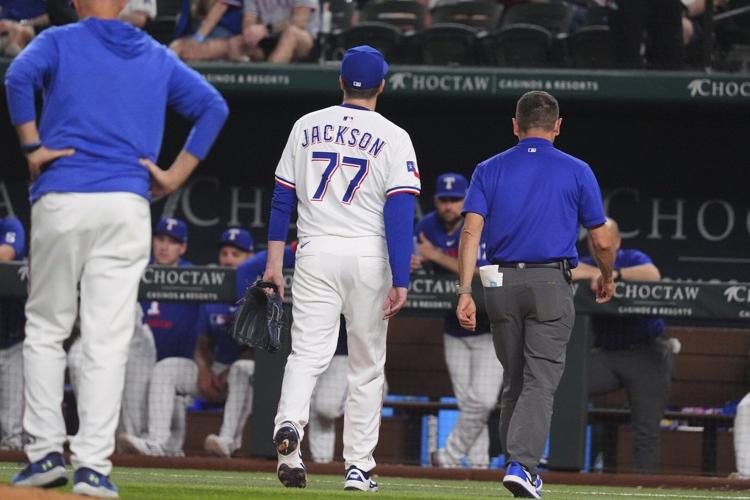 Rangers closer Luke Jackson takes comebacker off pitching hand on only his pitch against Rockies