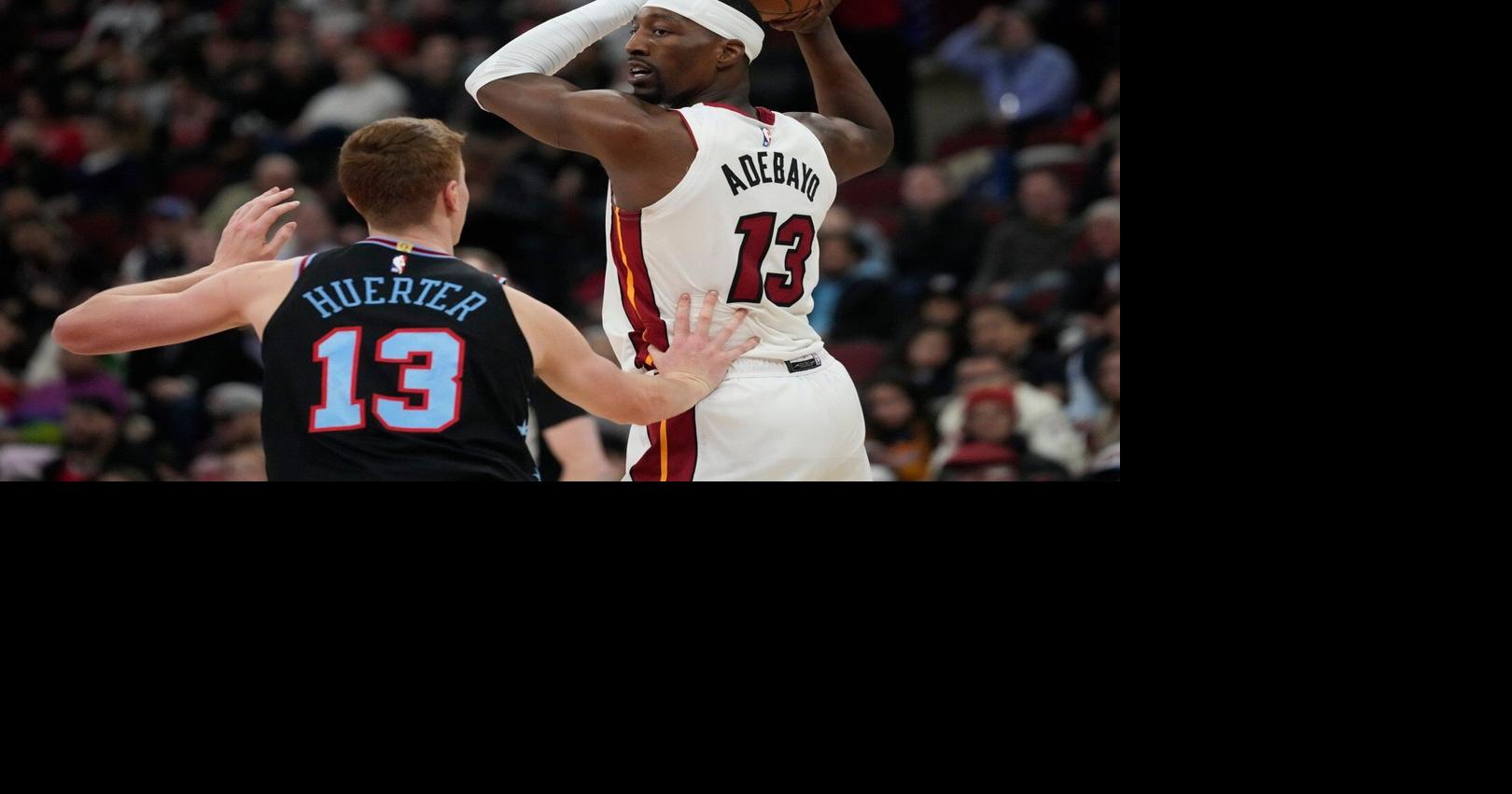 Powell scores 21 points and Heat outlast Bulls for 116-113 win