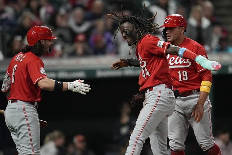 Reds' Joey Votto swaps signed jersey for fan's T-shirt during game