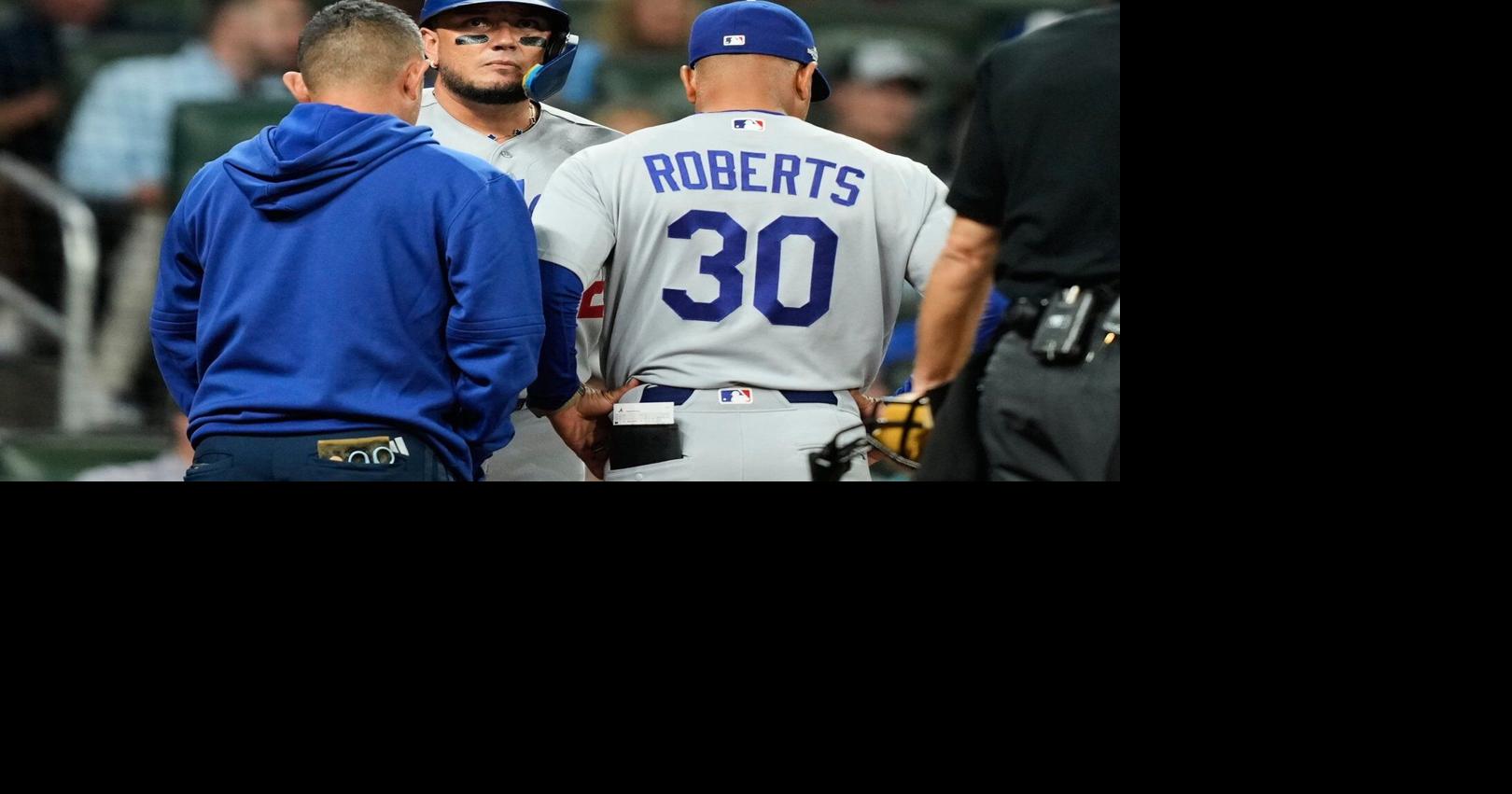 Dodgers hold out Miguel Rojas due to sore back. Ronald Acuña Jr. is ...