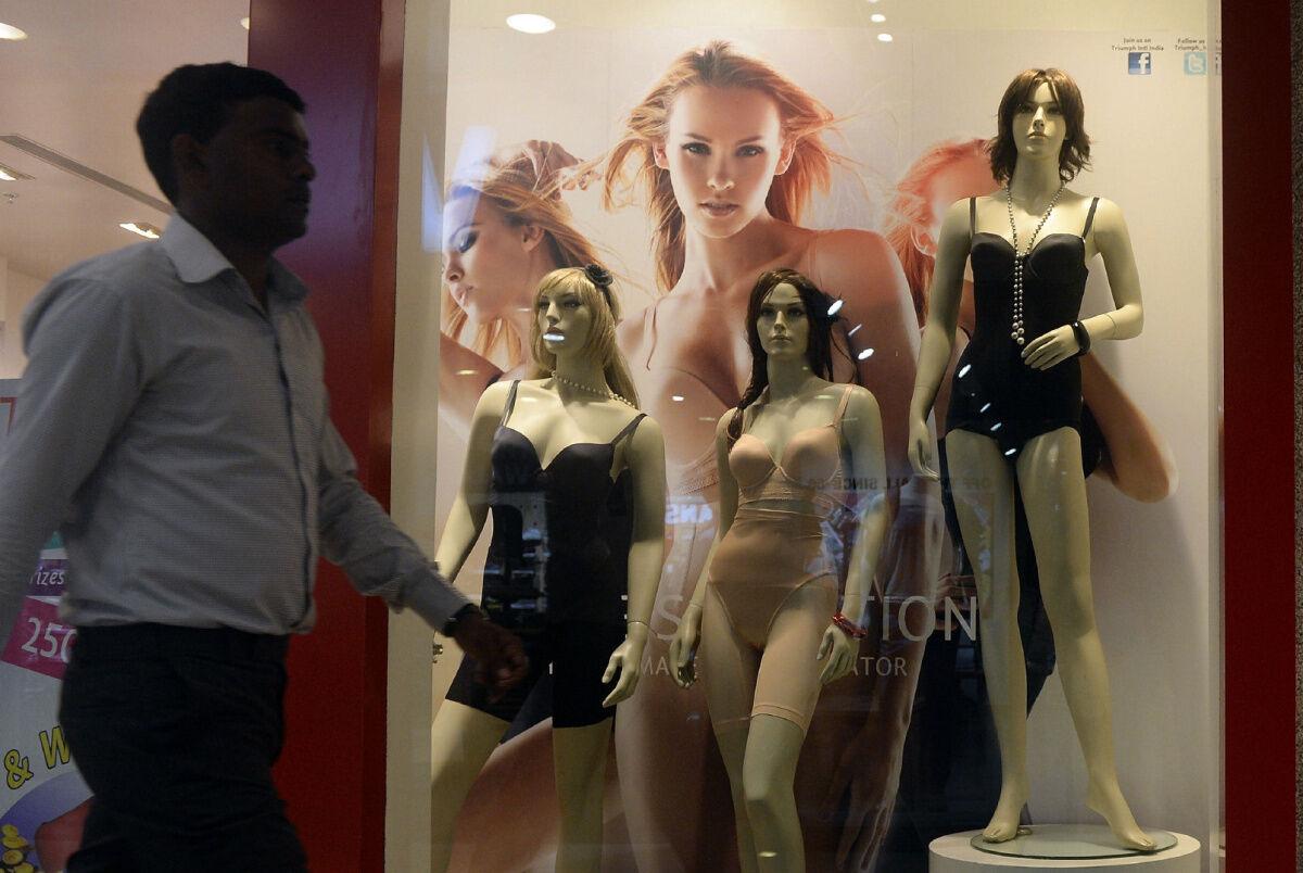 Men wear bras in Hong Kong to protest woman's 'breast assault
