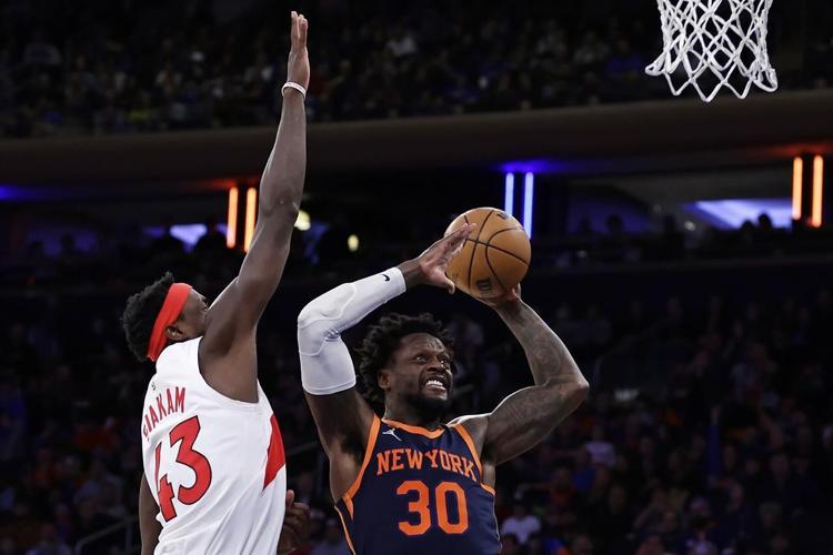 Raptors recover after Barrett tying slam, edge Knicks in OT