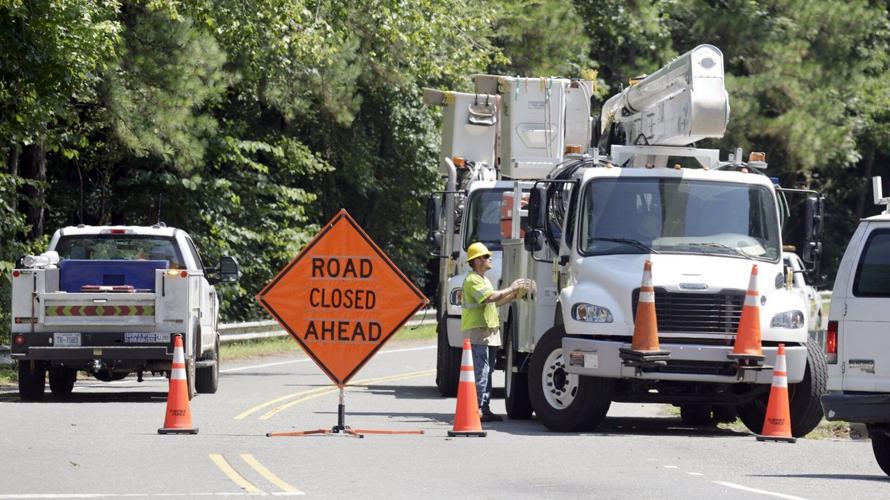 Rushing floodwater from heavy rain kills 2 in North Carolina