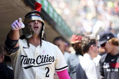 Twins win 8th straight, beating Giants 7-6 on Keirsey's RBI single in 10th