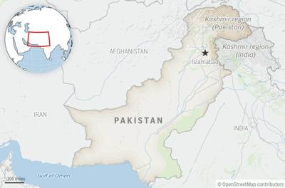 Bomb targeting a vehicle carrying police killed 2 officers in northwest Pakistan