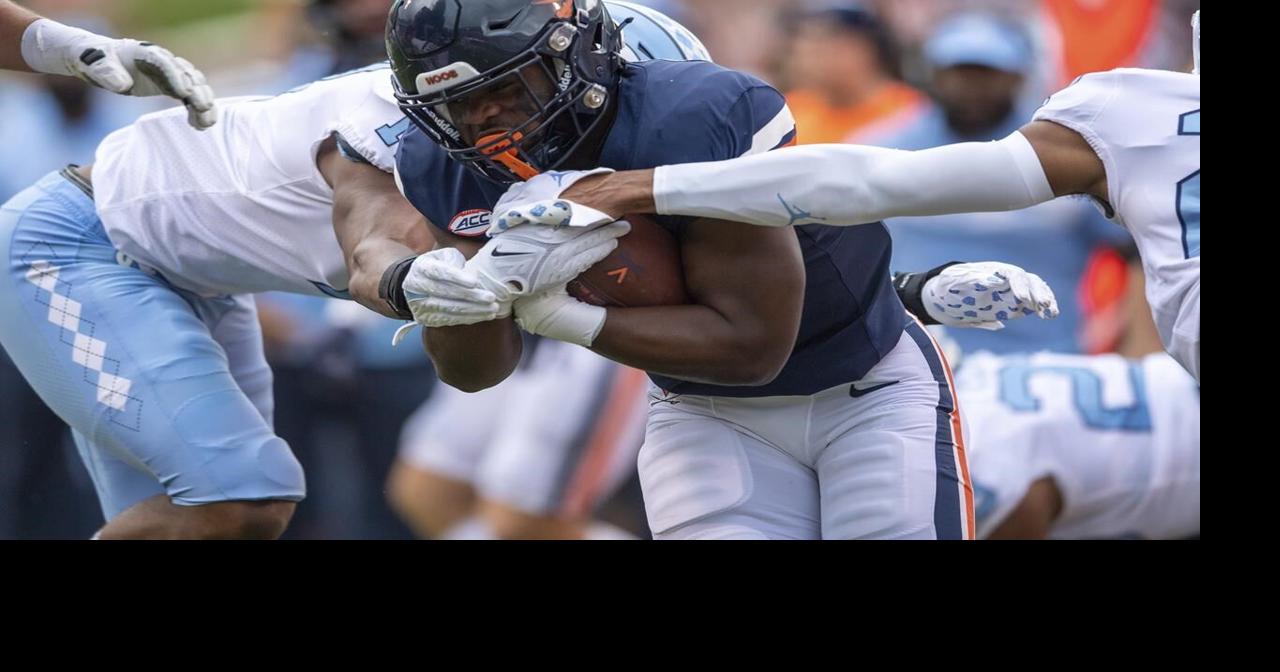 Virginia player wounded in deadly attack returns for a new season as an inspiration to his teammates