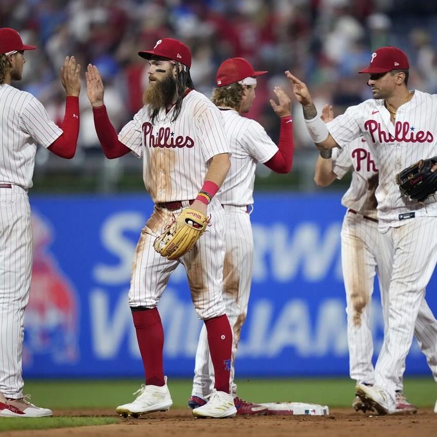 Nola, Schwarber help the Phillies beat the Brewers 4-3 for their 4th  straight victory