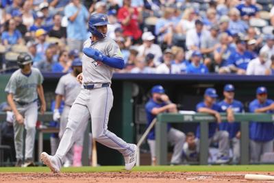 CP NewsAlert: Blue Jays clinch playoff spot with 8-5 win over Royals