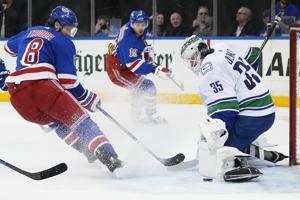Pettersson and Hoglander each score twice as Canucks down Rangers 6-3