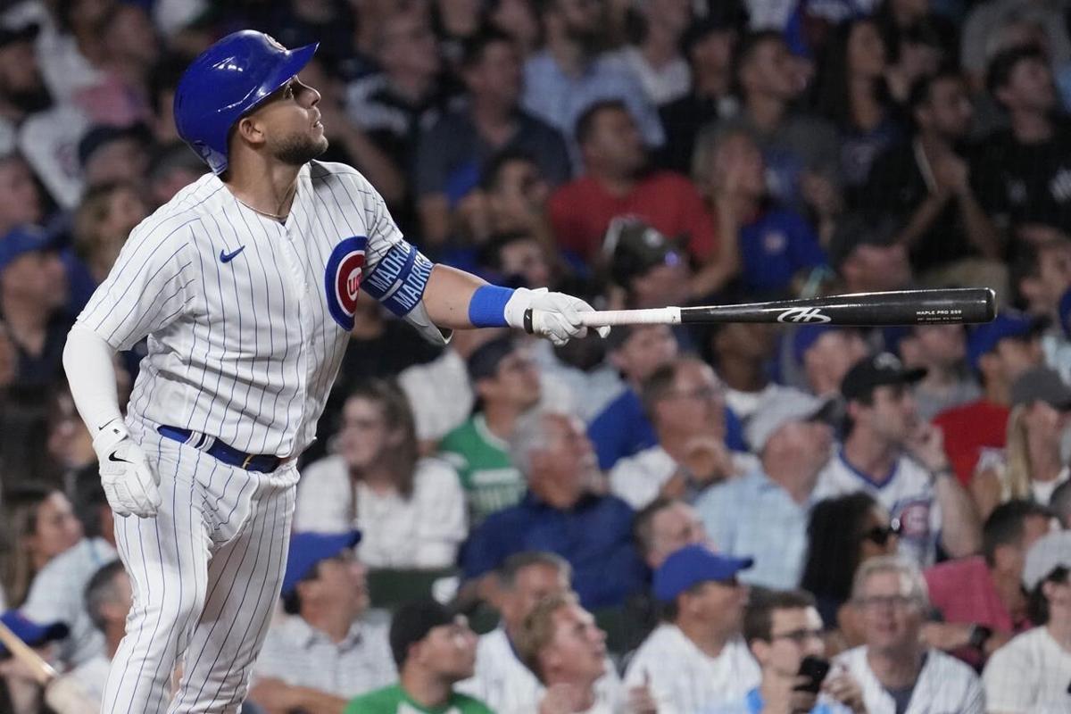 From left to right, Chicago Cubs' Nick Madrigal, Dansby Swanson (7