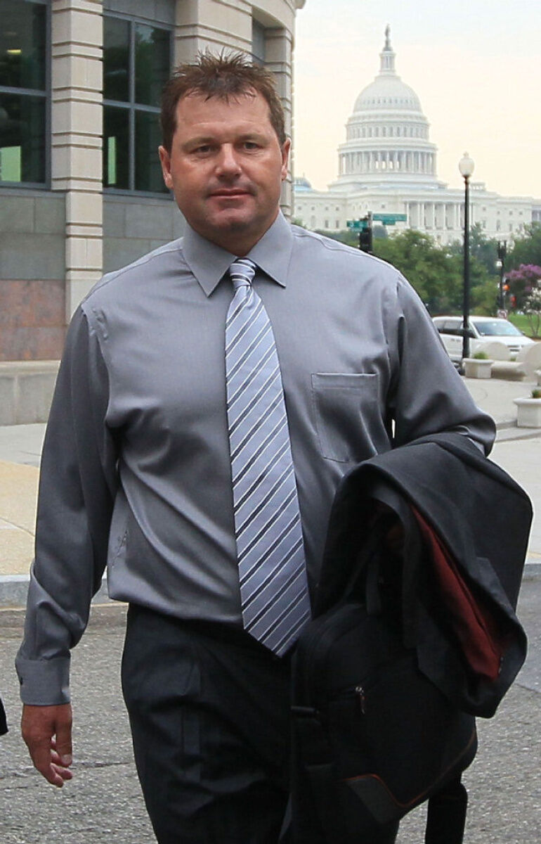 Former NY Yankees Pitcher Roger Clemens arrives with his wife Debbie at  Federal court for jury selection in his perjury trial in Washington, DC, on  July 6, 2011. Clemens is accused to