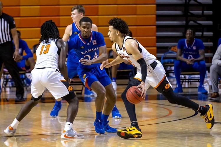 Cunningham scores 18; Oklahoma St. tops No. 6 Kansas 7570