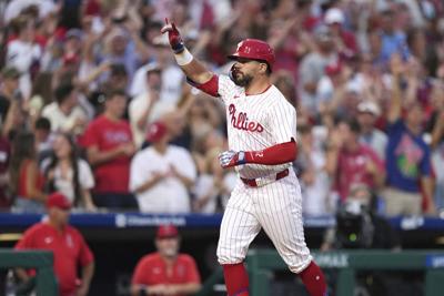 Schwarber's grand slam, Harper's homer lead Phillies to 9-5 win over Angels