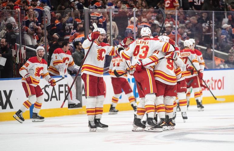 Flames rally for victory over Oilers, continue streak of season-opening ...