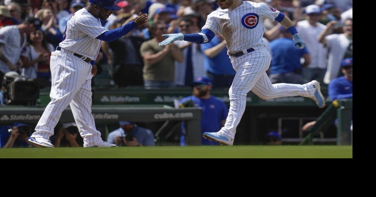 Happ, Steele lead Cubs past Marlins 4-1 to end 3-game slide