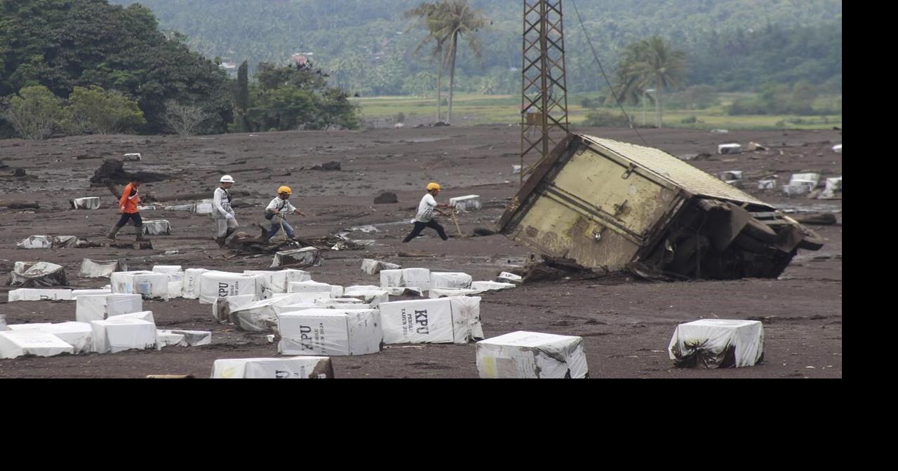 Indonesian Rescuers Search Through Rivers And Rubble After Flash Floods