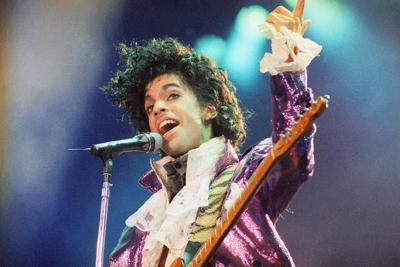 Prince's puffy 'Purple Rain' shirt and other pieces from late singer's wardrobe go up for auction
