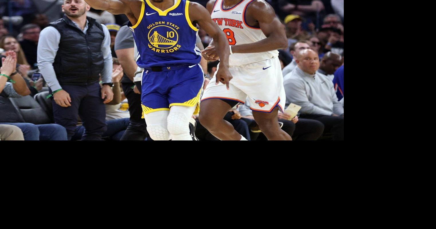 Warriors G Jimmy Butler goes down with right knee injury against Heat, will have MRI