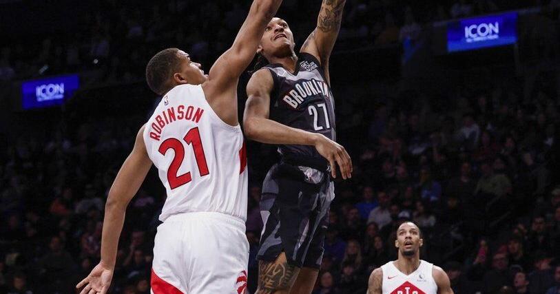 Toronto Raptors waive centre Orlando Robinson and forward Cole Swider