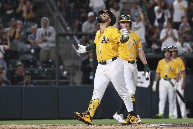 Athletics beat Reds 3-0 as Carlos Cortes hits 2 homers