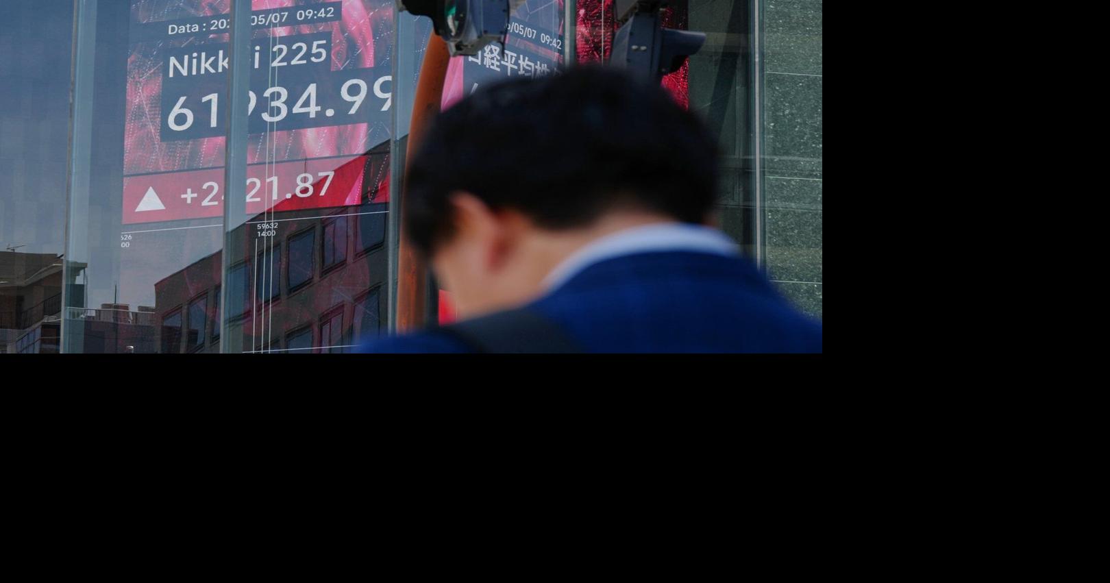 Asian shares mostly gain and oil prices fall after Trump says peace talks on Iran war are proceeding