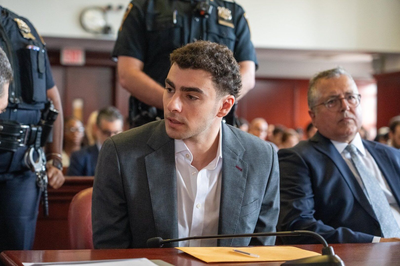 Luigi Mangione pleads guilty to stalking charges, admits killing UnitedHealthcare CEO Brian Thompson; lawyers seek to toss state case on double jeopardy