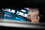 Asian shares fall after a tech sell-off on Wall Street, while oil prices stabilize