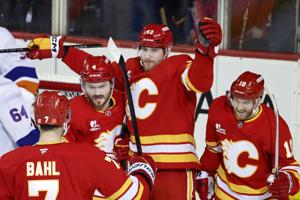 Klapka, Wolf lead Calgary Flames to 4-2 victory over New York Islanders