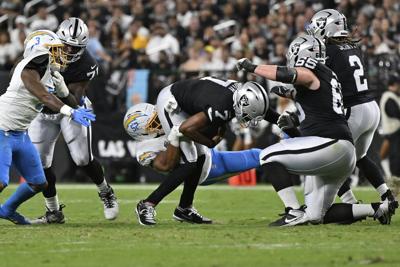 Chargers' Khalil Mack injures elbow, questionable to return against Raiders