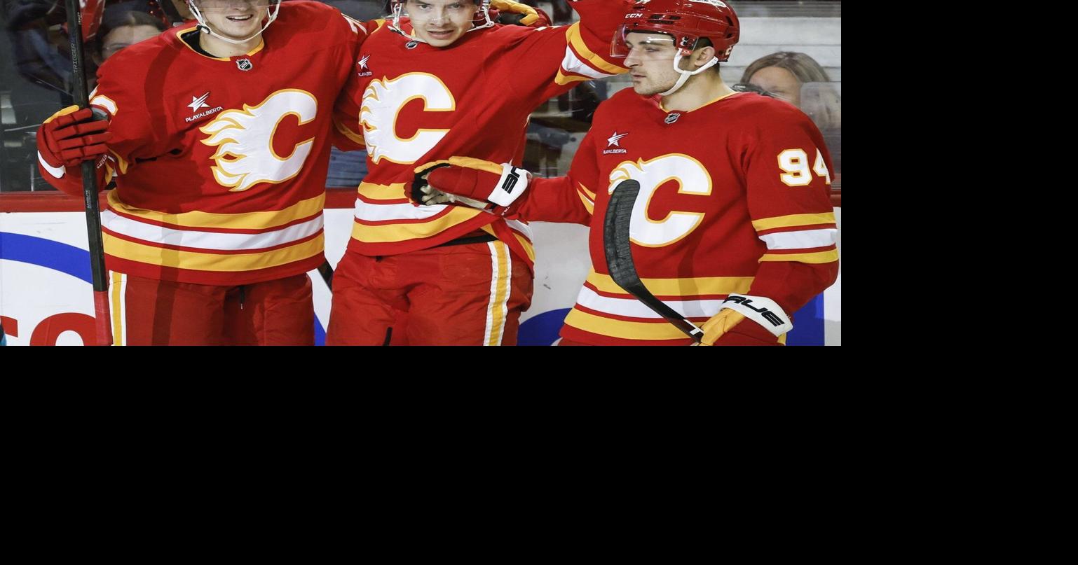 Sharangovich scores twice as Flames keep playoff hopes alive