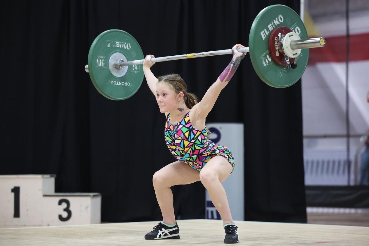 Weightlifter petite, and powerful, News