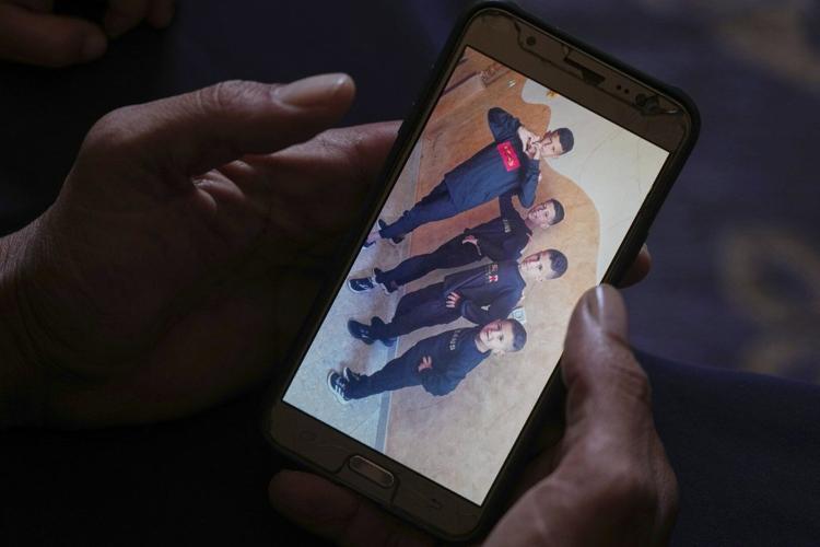 A father mourns 2 sons killed in an Israeli strike as hunger worsens in Gaza