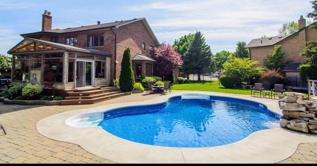 Northwest Pickering home for 898,800 has salt water pool, solarium