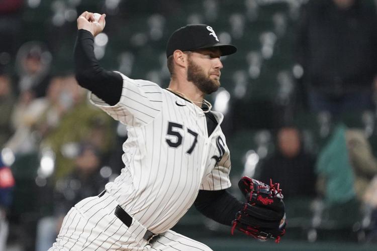 Houser gets a win in his return to the majors as the White Sox beat the Mariners 1-0