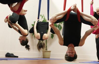 Yoga Asanas: Aerial, Acrobatic, Aqua: 5 Types Of Yoga That Are Becoming A  Fitness Trend