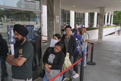 A day outside an LA detention center shows profound impact of ICE raids on families