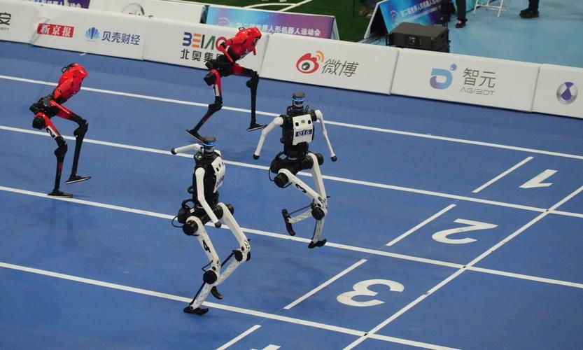 A robot sprinter shatters a 100-meter record again as sparks fly at ...
