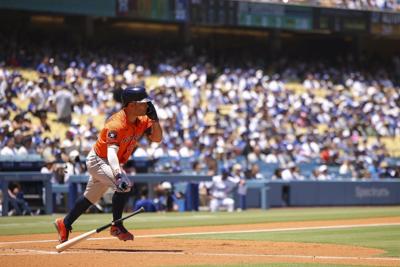 Christian Walker, Yainer Diaz and Jose Altuve homer in Astros' 5-1 win to complete sweep of Dodgers
