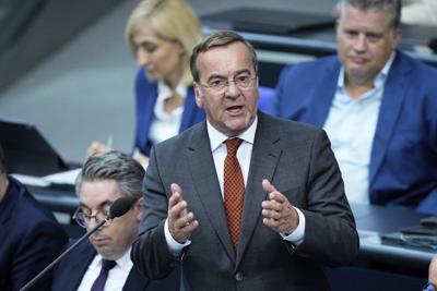 German defense minister says Russia is tracking two satellites used by the German military