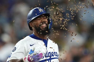 Dodgers open 2-game lead in NL West with 7-2 win over Rockies