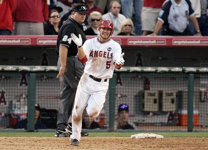 Perkins: Angels get new life with 11th-inning win