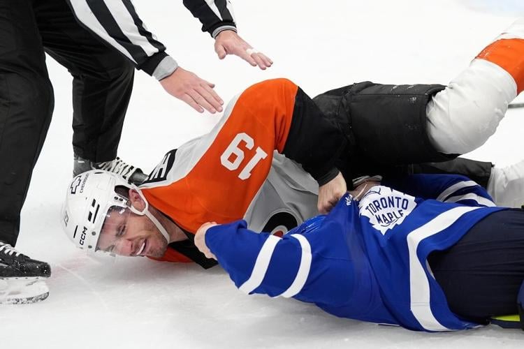 Leafs win 3-2 in overtime over Flyers, McCabe hurt in fight