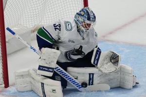 NHL scores: Boeser has hat trick, last-place Canucks overcome blowing 4-goal lead to beat NHL-leading Avs