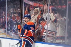 Hyman scores, Oilers come back to beat Sharks 4-3 in overtime