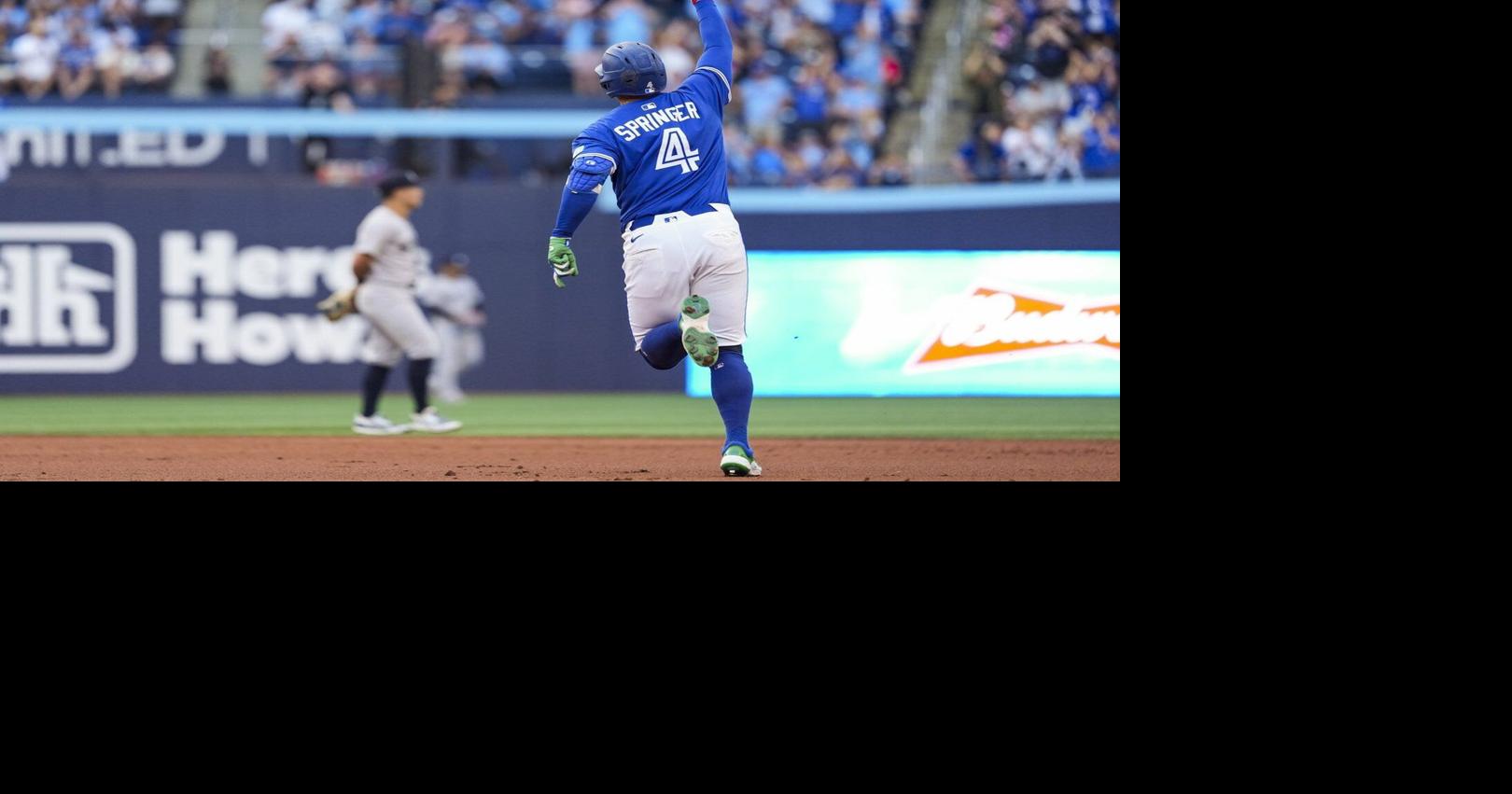 Springer homers twice, Blue Jays win 8-5 to sweep Yankees and take first in AL East
