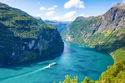 Fjord Geirangerfjord with cruise ship, Norway.
