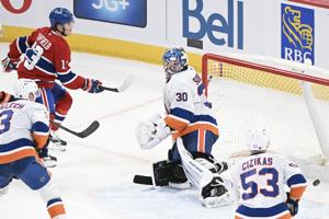 Caufield scores hat trick in five-point night, Canadiens crush Islanders 7-3