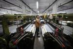 How one Indian textile worker copes with extreme heat in factory work and cramped living quarters