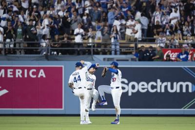 Dodgers clinch 13th straight postseason berth as Kershaw pitches final regular-season home game